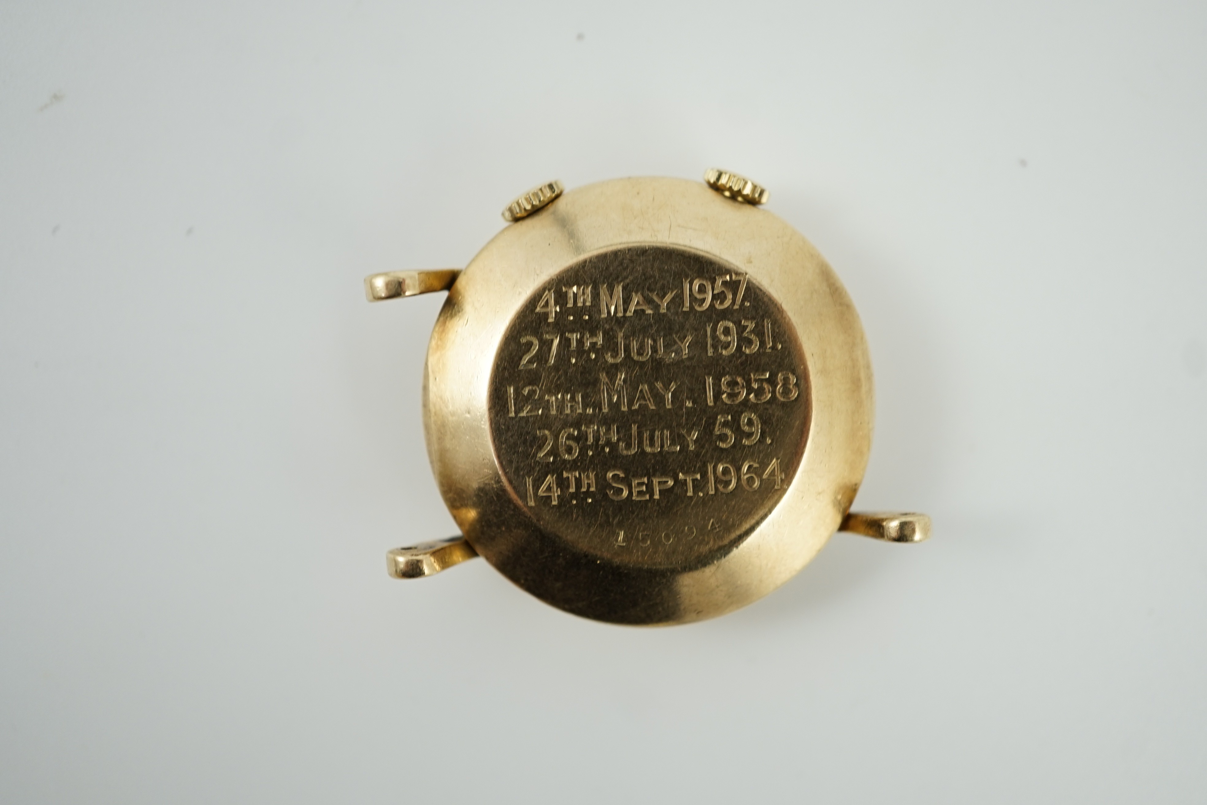 A gentleman's 9ct gold Jaeger LeCoultre memovox wrist watch, with case back inscription and lacking one lug, case diameter 32mm, gross weight 26.4 grams.